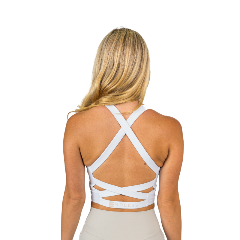 NDLESS-Studio-102_ndlesswaer_womenswear-crosstop-top-workout-top-crosstop-white-top.one.png